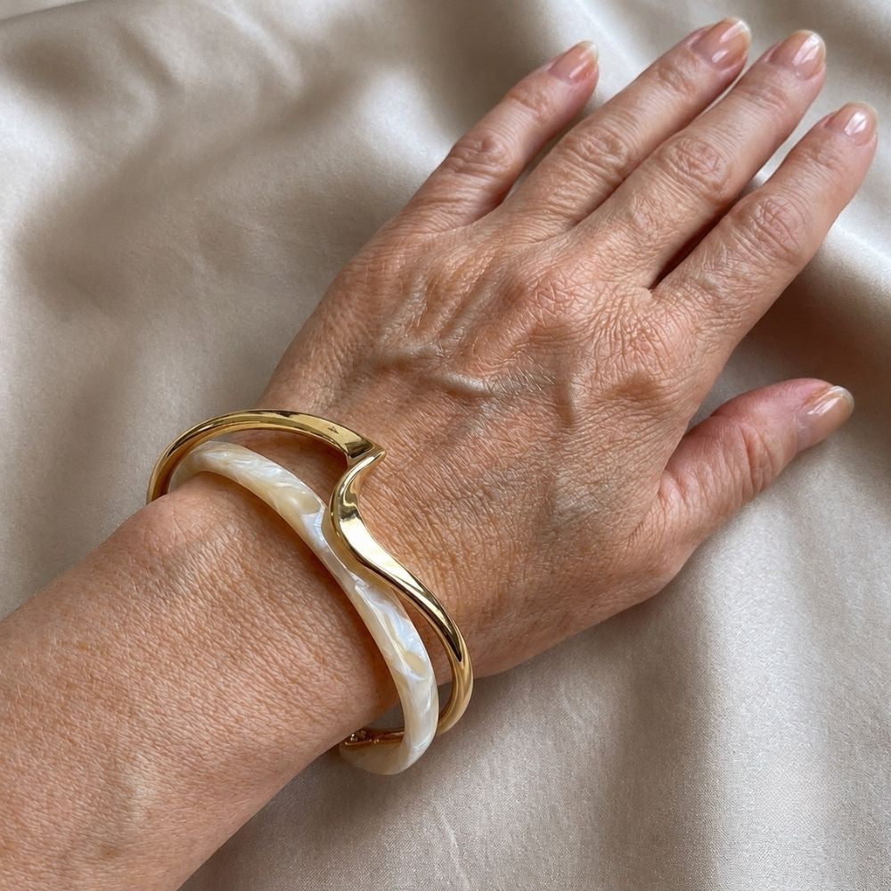 White opal elegant golden bracelet
